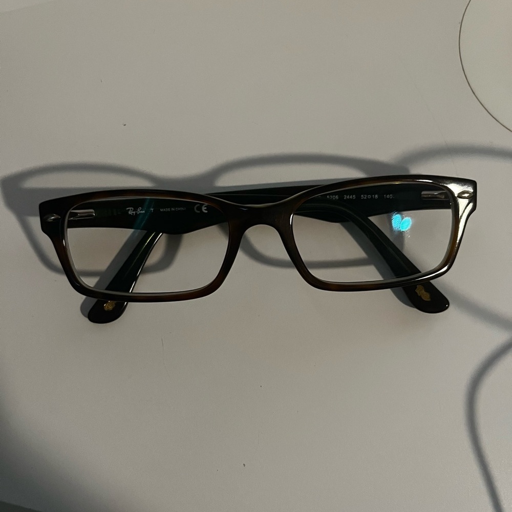 Ray-Ban Brown Eyeglasses tortoise with a light green inside